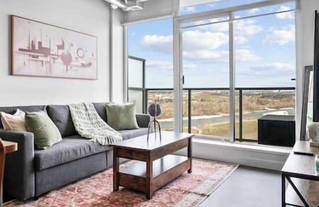 5 min Walk to Stampede | King Bed | Sofa Bed | AC