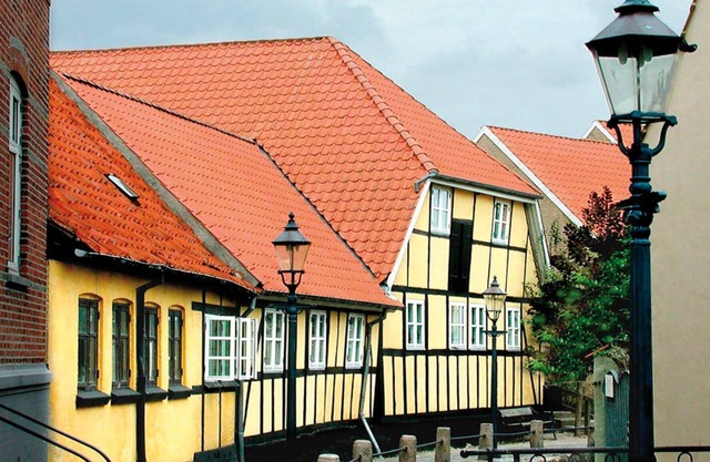 8 person holiday home on a holiday park in Bogense