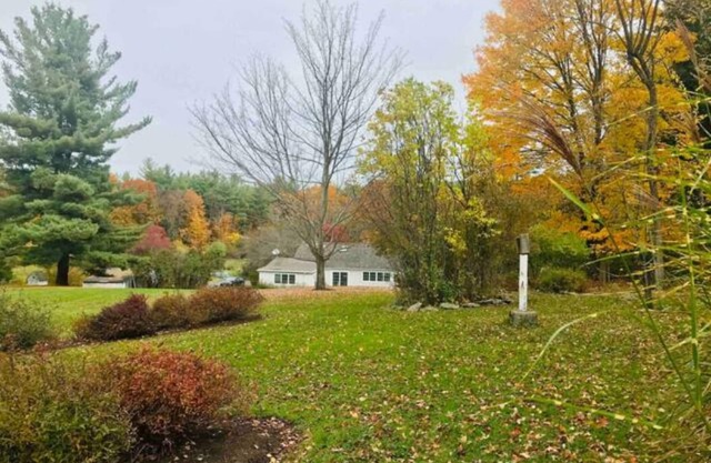 9 acres of elegant gardens, rolling lawns, wooded paths and a private pool