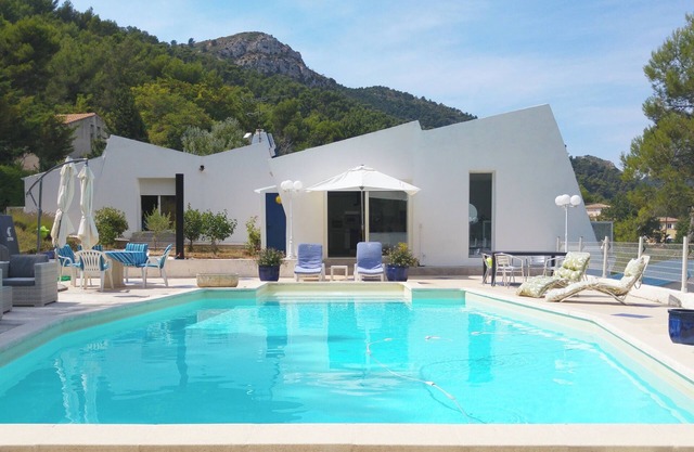A BALCONY OVERLOOKING SAINTE VICTOIRE