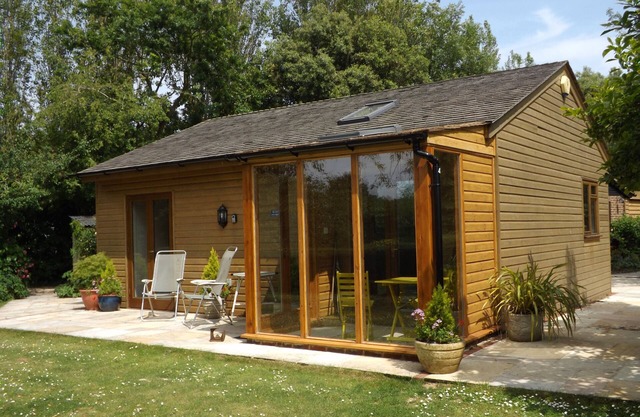A beautiful pine chalet with its own private garden surrounded by fields