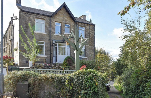 A beautiful cottage boasting wonderful views over the surrounding Colne Valley.