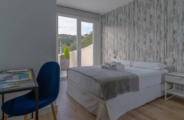 A casa da reina Apto. con terraza 103 planta baja