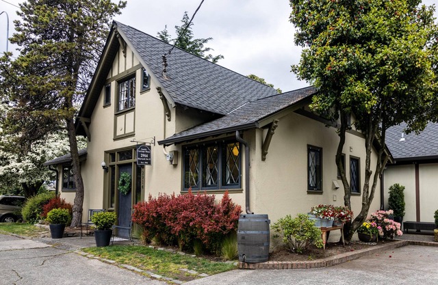 A charming little city cottage with backyard chickens awaits your arrival.