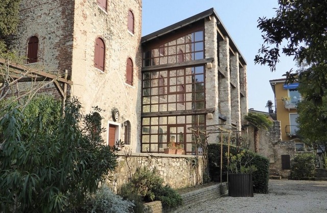 A fascinating Medioeval Tower on the borders of Lake Garda