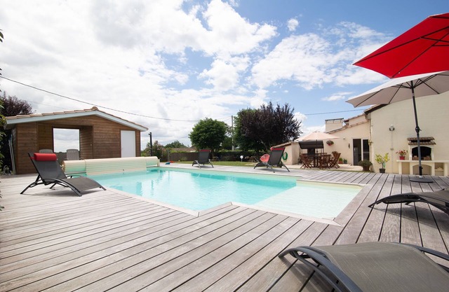 A Gite called La Grange, with garden, BBQ area and heated swimming pool.