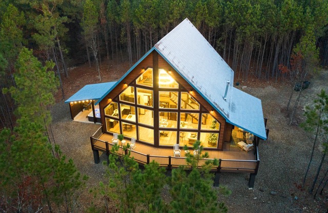 A one-of-a-kind architectural masterpiece with massive window wall with view!