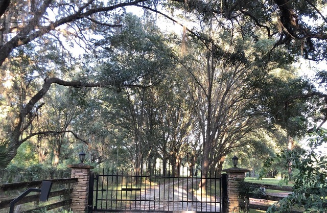 A Private Country Home on 15 Beautiful Acres just miles away from city life!