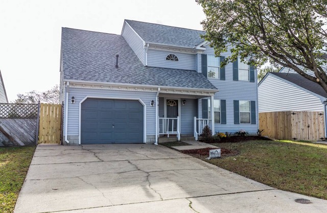 A quiet lakeside home for family, business, or both to relax or be productive.