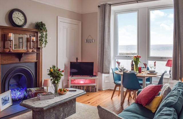 A spacious apartment with stunning views over Gare Loch.
