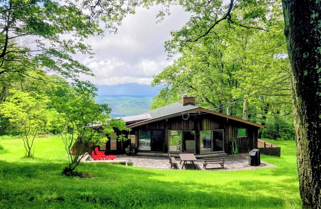 A spectacular Shawangunk vista in a beautifully renovated chalet on a lush lawn.