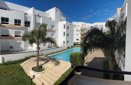 Achakkar Hills Seaside Family Apartment with Pool, Beach Access, AC, Parking, Play Area