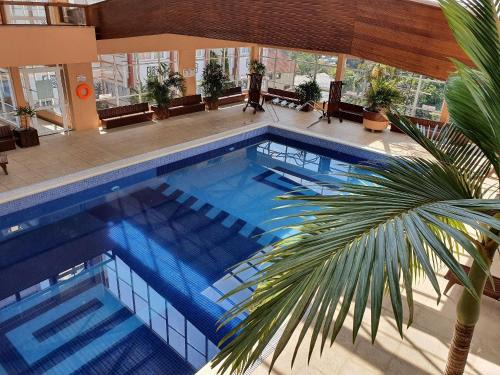 Aconchegante Apto de 2 Dormitórios no Centro de Gramado – c/Piscina Térmica