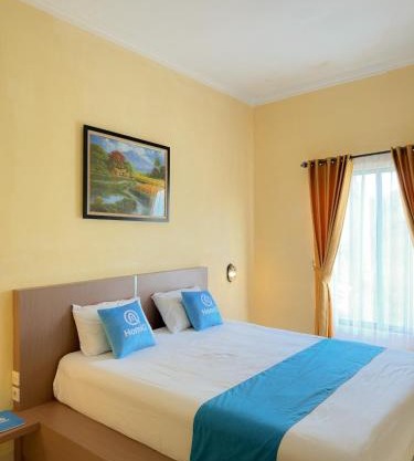 Adiputra Guesthouse Tata Bumi by HomiQ