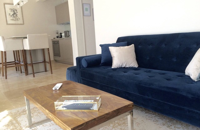 Air-conditioned apartment with large terrace on property with swimming pool