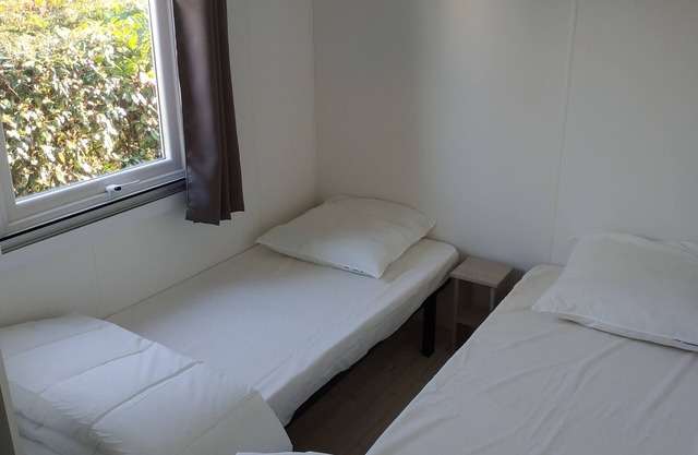 Air-conditioned mobile home with TV