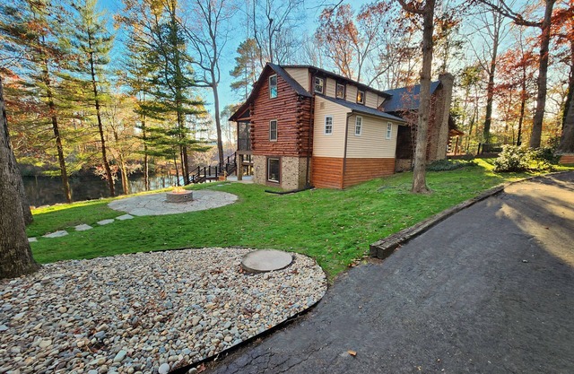 Amazing log cabin - 5 acre stocked pond - 16 acres - Minutes to Kings Dominion