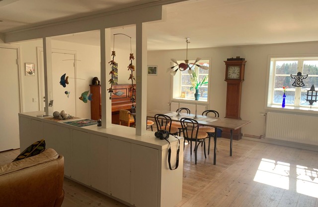 An apartment with generous space for socializing with family and friends.