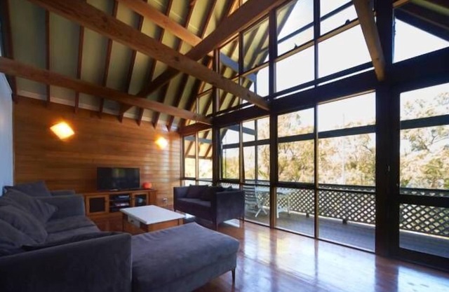 An island style escape - Stunning oak A-frame Waterfront home Access by water