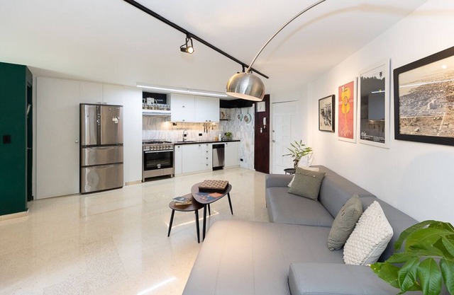 An organic Modern style meets city center, this apartment has it all