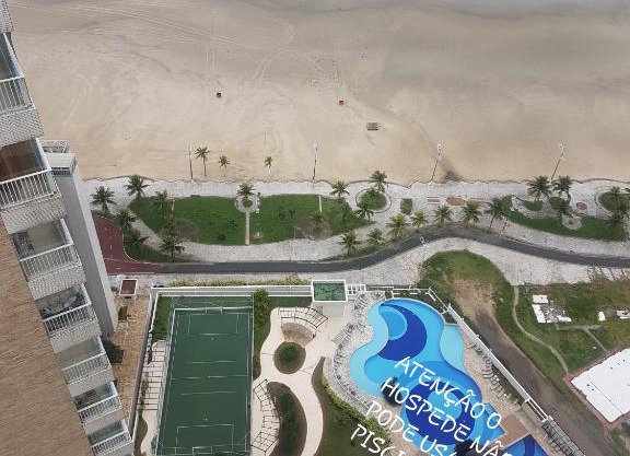 Ap pé na areia frente praia Costa do sol