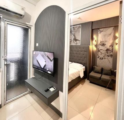 Apartement Green Pramuka Square 2br DeluxeRoom