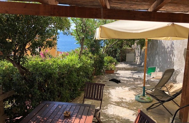 Apartment with exclusive garden and seaview in Pomonte, 50 meters from the sea