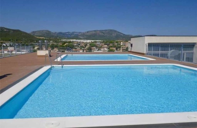 Apartment with pool sea view. Beach at 900m