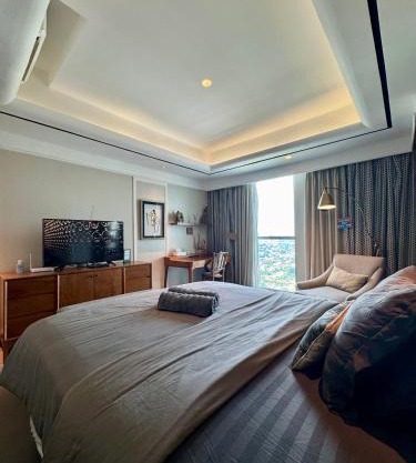 Apt Kemang Village Tower Intercon with Wi-Fi and Pool by Damaresa