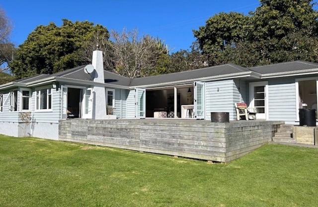 At the beach but in your own little peace of paradise