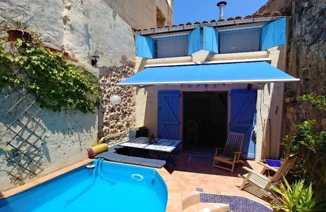 Atypical village house with swimming pool amidst vineyards