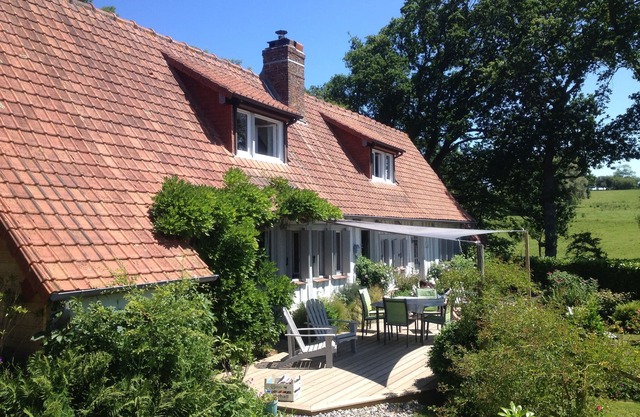 authentic Norman half-timbered house with landscaped park near woods and sea