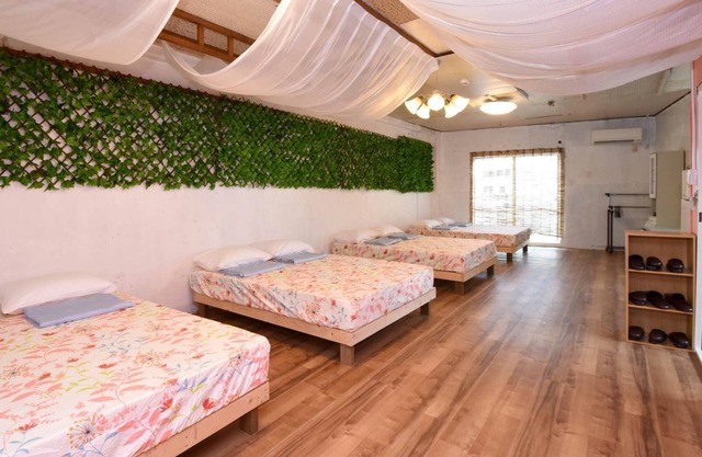 B It is a simple room with a chea/Naha Okinawa