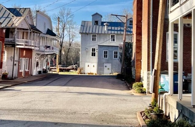 Bank Loft with Original Vault in River Town