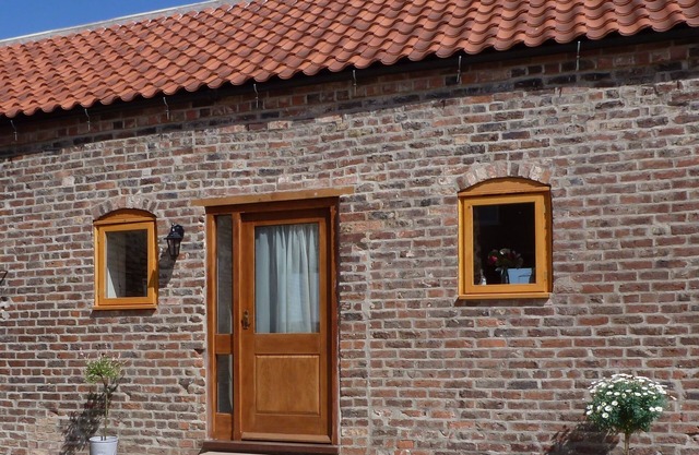 Barn conversion on small working farm