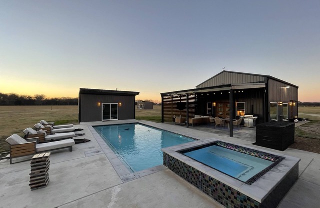 Barndominium in the Country on 11+ Acres: resort like pool/game room/guest house