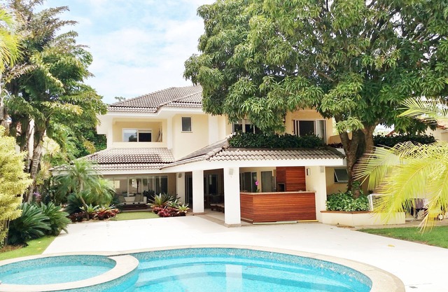Barra da Tijuca mansion with sauna and pool, in gated community with clubhouse and ferry to the beach.