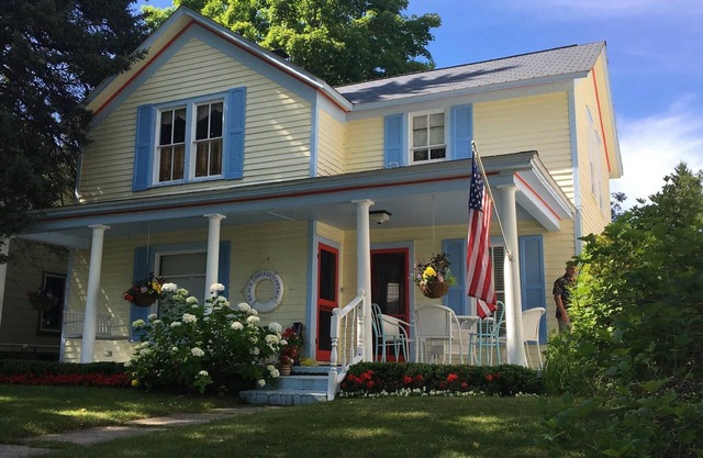 Beach Breeze Cottage Upstairs, just steps from the beach, sleeps 4