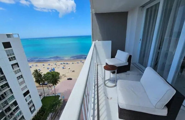 Beachfront 2 bedroom apt in Isla Verde. 2-5 minute walk to restaurants & shops!