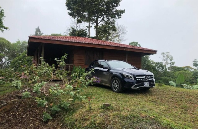 Beautiful Log Cabin in Tinamaste with stunning views of waterfall and forest