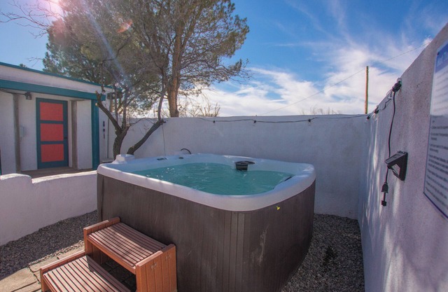 Beautiful and fun 5 bedroom house with a hot tub, arcade games and lots of room.