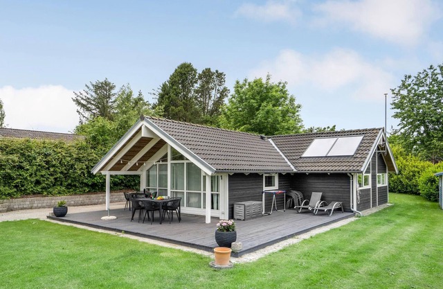 Beautiful cottage with kitchen and living area in one room.