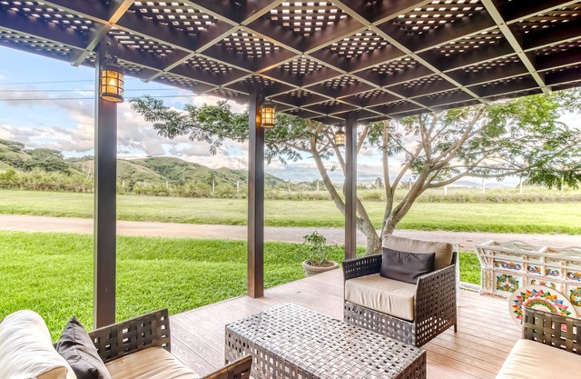 Beautiful ground-level house with furnished terrace, gardens, and shared pool!