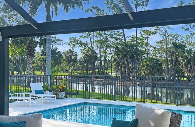 Beautiful home with panoramic views on the 17th hole of prestigious Eagle Creek