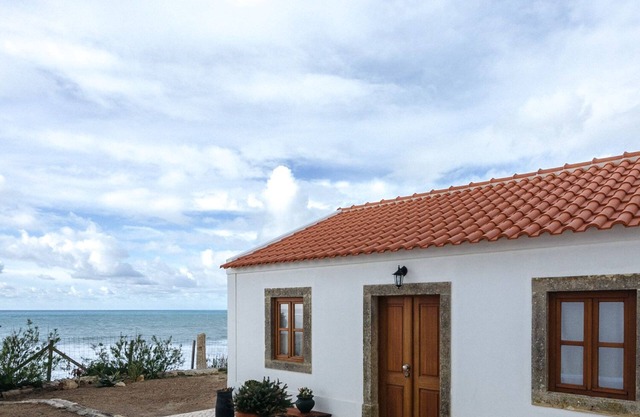 BEAUTIFUL HOUSE ON A CLIFF BY THE OCEAN