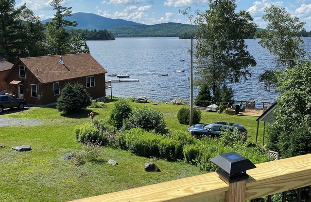 Beautiful lakefront camp with sunset view over big moose mountain