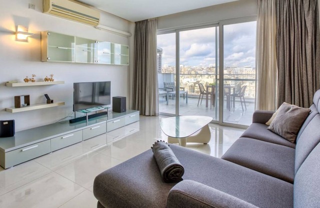 Beautiful seafront home with private balcony & BBQ