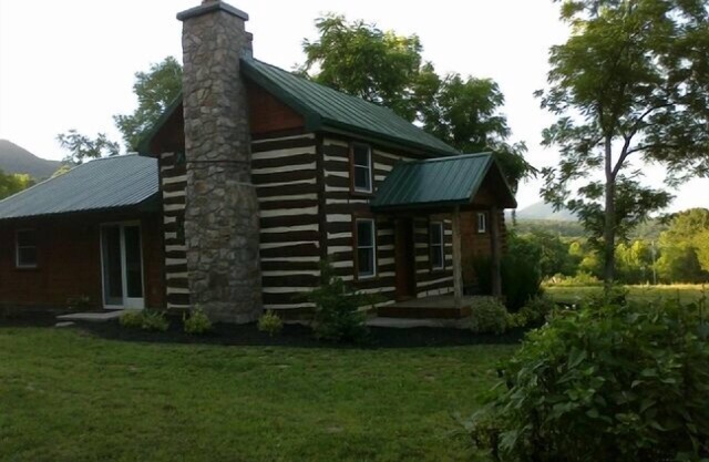 Beautifully appointed log cabin features mountain views, river, trails, WiFi