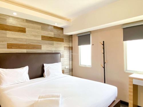 Best Deal and Homey 1BR Apartment Grand Sentraland Karawang By Travelio