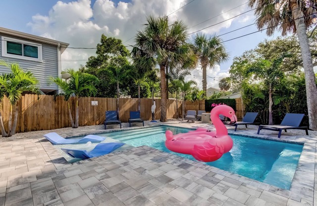 Blushing Flamingo- Triplex with heated pool, across the street from the beach